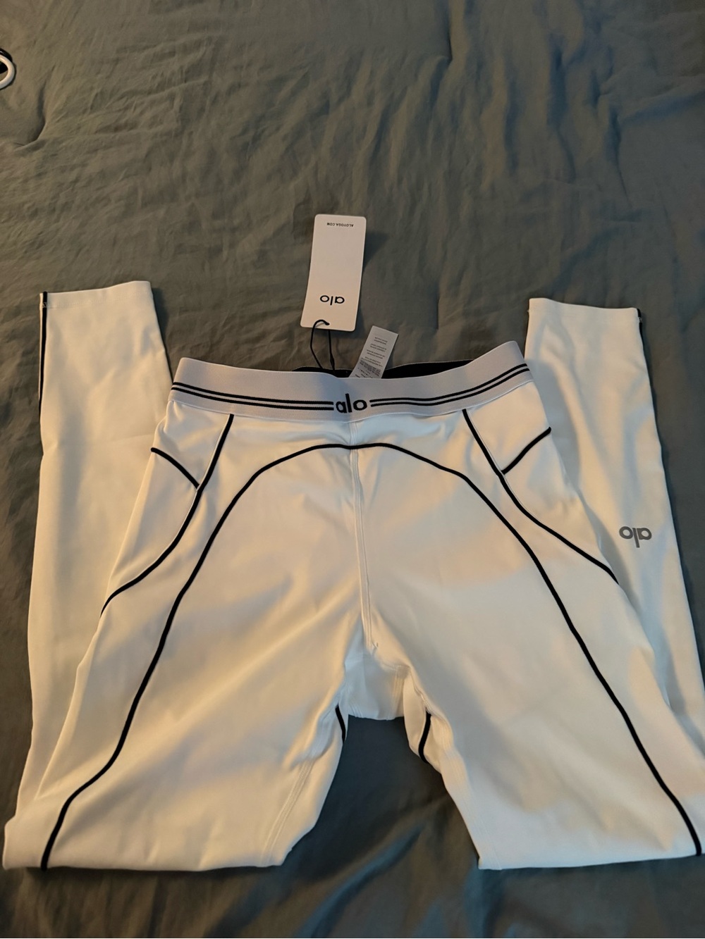 ALO Yoga  White Performance Leggings with Black Piping